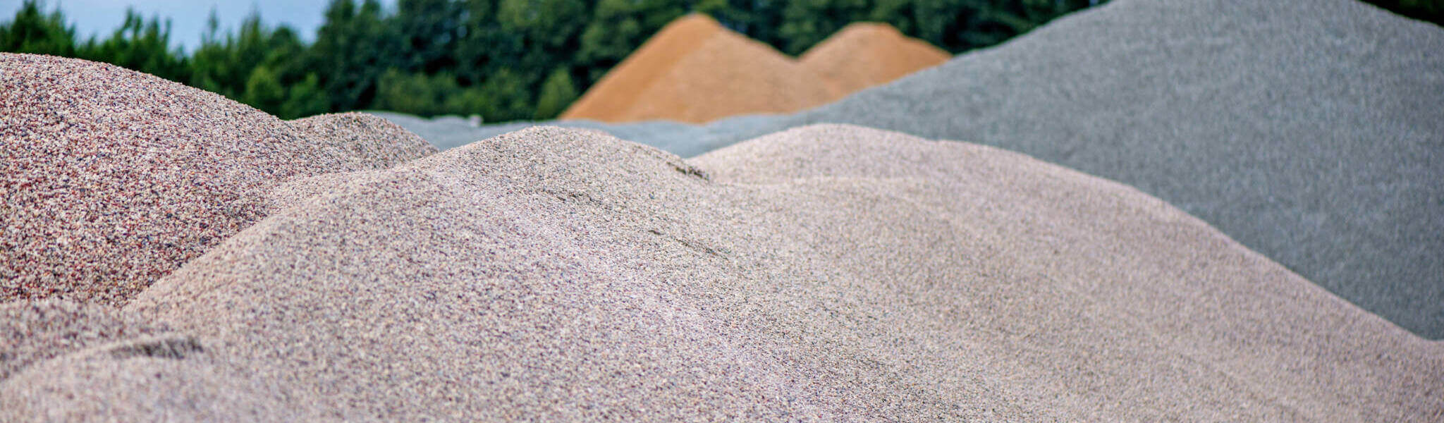 Large Piles Of Construction Sand And Gravel Used For Asphalt Production And Building. Limestone Quarry, Mining Rocks And Stones